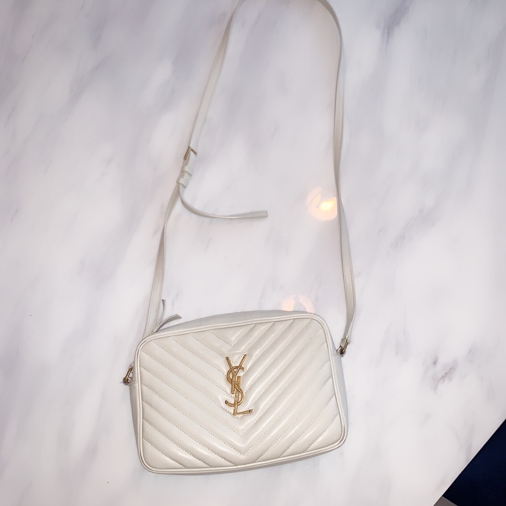 Purchased from Neiman Marcus in 2021 and used occasionally, cleaned often.